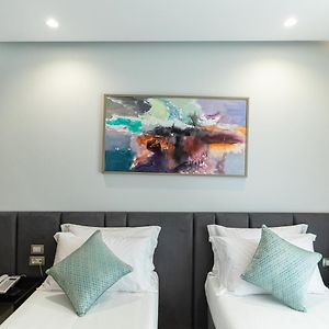 Kamer met een Queen Size Bed